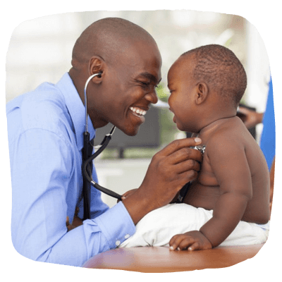 A pediatric doctor examines a baby with a stethoscope