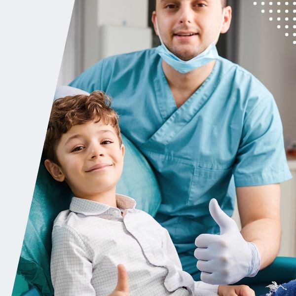 A pediatric Doctor and Kid smiling at Pediatric Urgent Care clinic